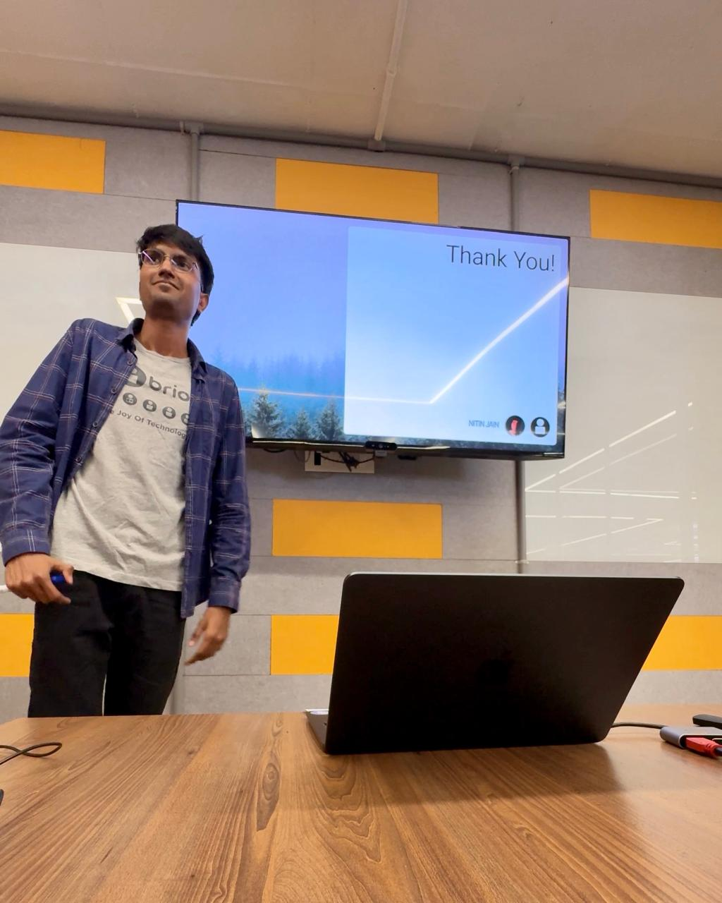 Stylized blue and pink image of a whiskey glass with the wordmark of Vèloce in pink all-caps letters above.